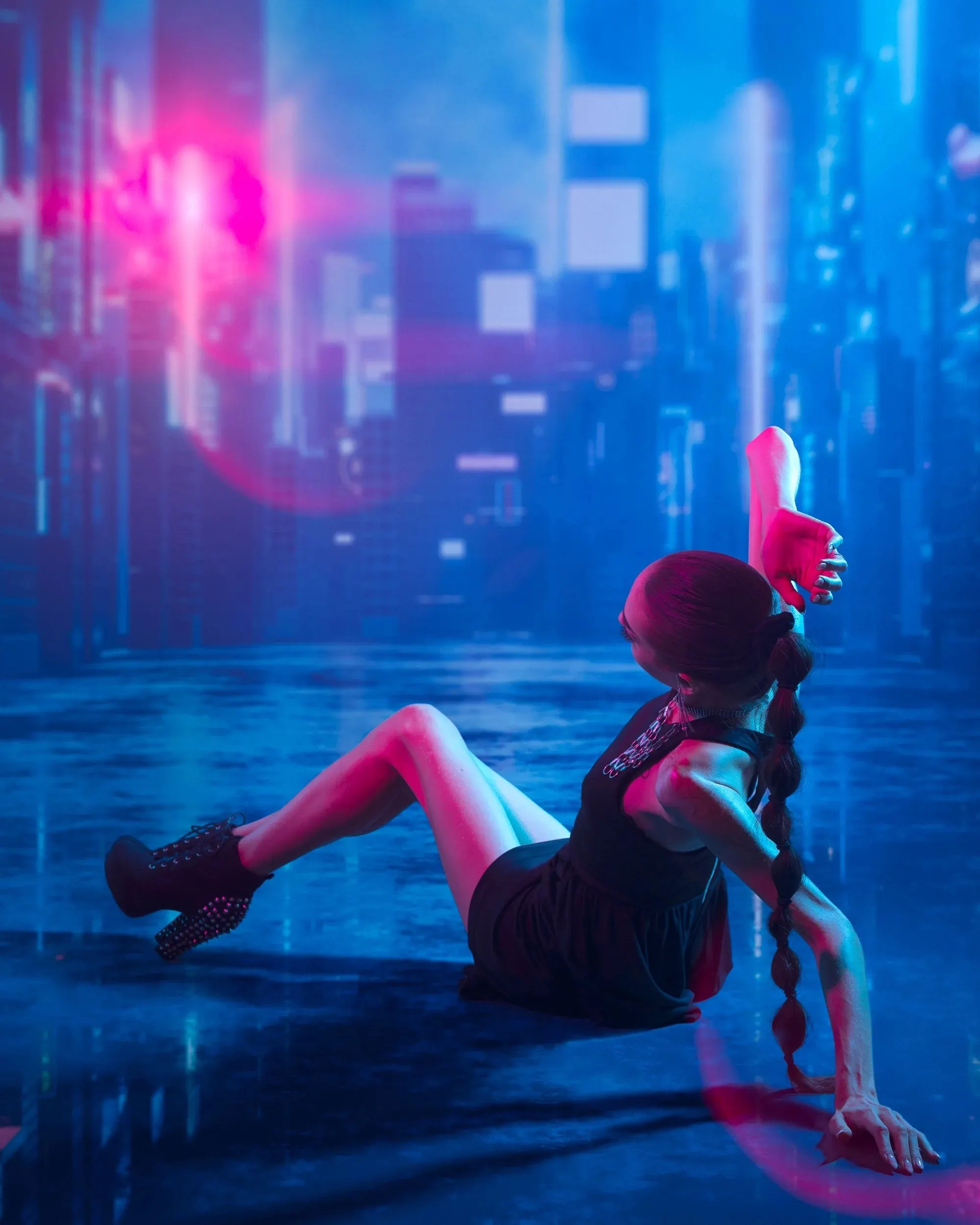 A seated woman reaches upward in a hazy blue-and-magenta cityscape.